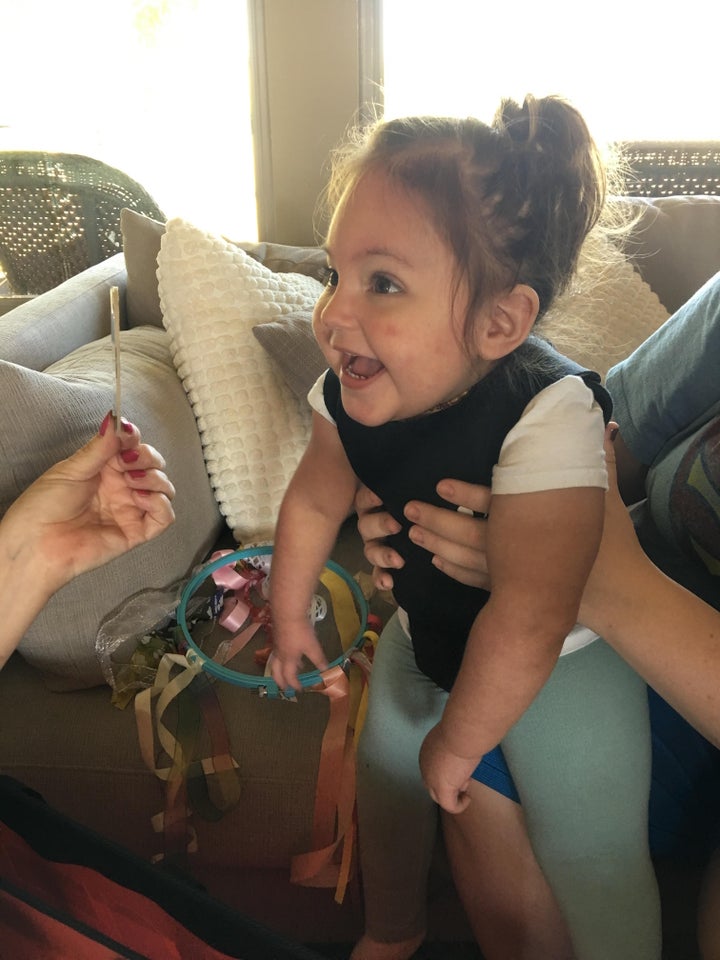 <p>Ellis in her core stabilizing vest, receiving Vision Therapy</p>
