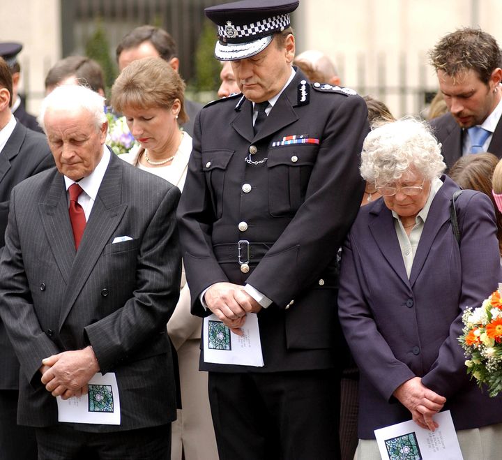 The parents of murdered Pc Yvonne Fletcher, Tim and Queenie, stand between then police commissioner Sir John Stevens, at a memorial service in London marking the 20th anniversary of her death