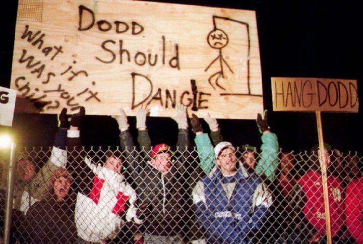 January 1993: People cheer outside the Washington State penitentiary after confessed child killer Westley Allan Dodd died by hanging. Homewood said he consulted on the execution.