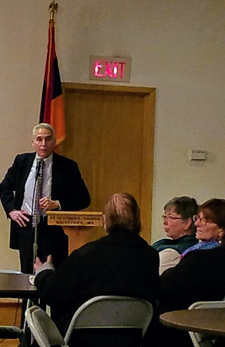 <p>Filmmaker Roger Hagopian addresses audience at St. Stephen’s Church Hall in Watertown.</p>