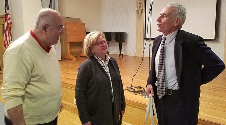 <p>Hagopian (r) chats with Houry Boyamian, Principal of St. Stephen’s Elementary School, and husband Avo.</p>