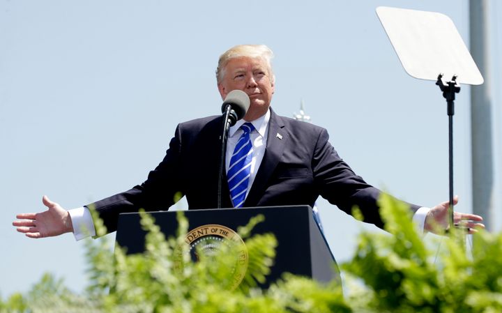 Trump gestures as he addresses the graduating class of the U.S. Coast Guard Academy during commencement ceremonies in New London, Connecticut.