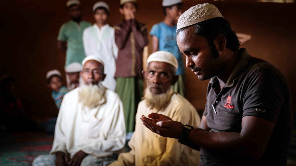 Nur Kabir takes a break from his work as a doctor to pray. The Rohingya are a Muslim ethnic minority group in Myanmar, which
