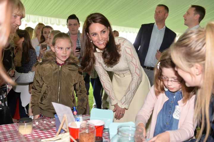 The Duchess of Cambridge mingles with some of the guests.