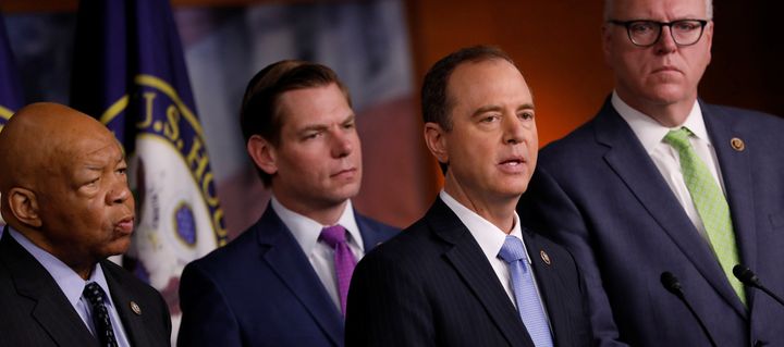 Democratic House members Adam Schiff of California, second from right, accompanied by Elijah Cummings of Maryland, left, Eric Swalwell of California and Joe Crowley of New York, talks about recent revelations about President Donald Trump on Wednesday. Schiff said that "the country has to believe that the series of conduct is such that this president cannot continue in office" before they seriously consider impeachment proceedings.
