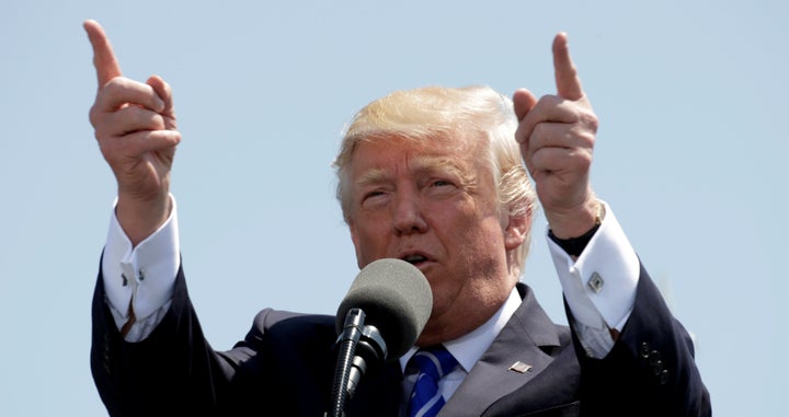 President Donald Trump speaks during the United States Coast Guard Academy Commencement Ceremony in New London, Connecticut U