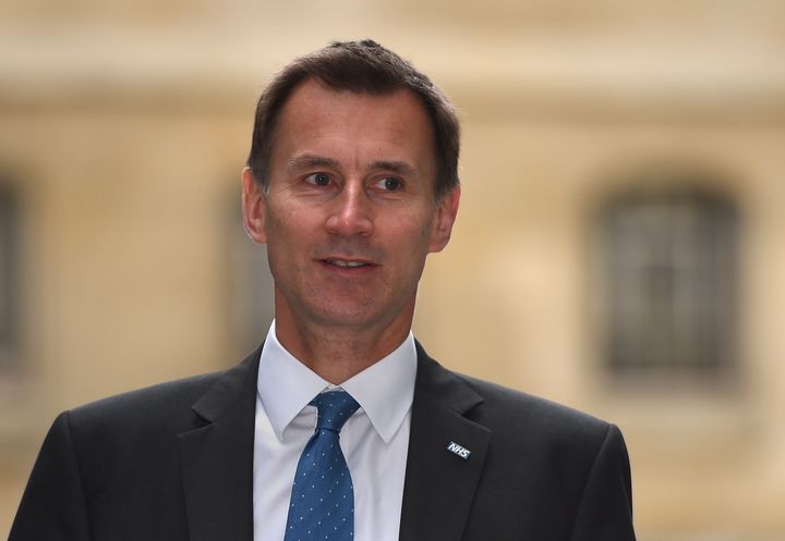 Jeremy Hunt has admitted the Tories are 'dropping' a key 2015 election pledge on elderly care.
