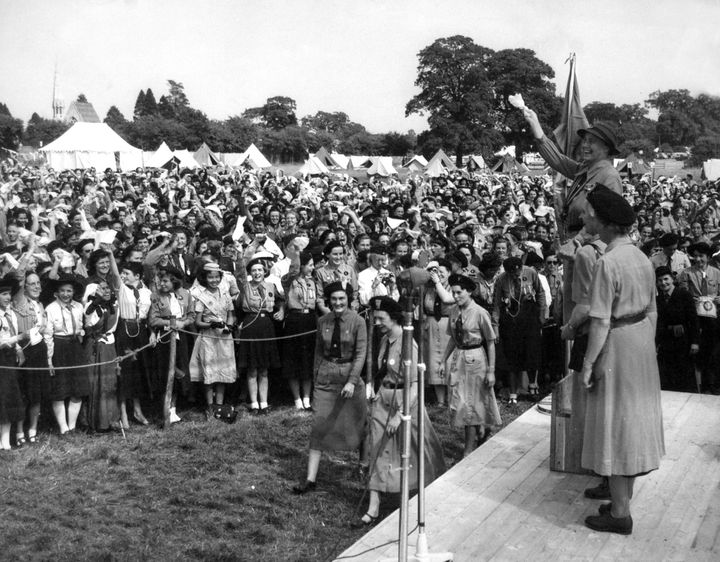 Girlguides from all over the world listen to World Chief Guide, Olave, Lady Baden Powell. Windsor Great Park,1957.
