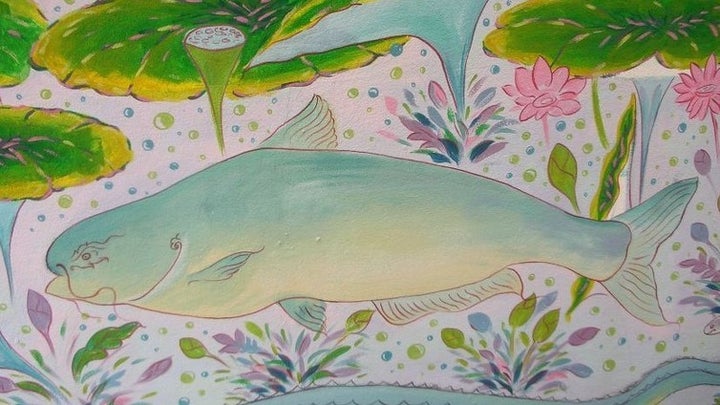 A painting of a <em>Pla Beuk</em> at a Thai temple.