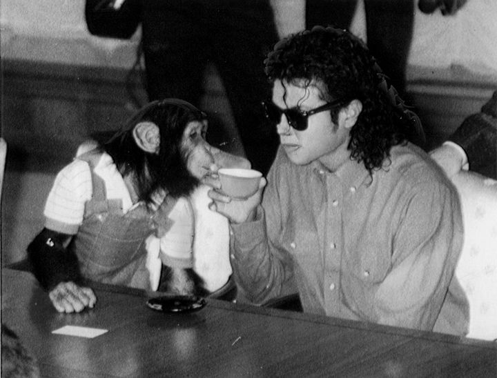 Michael Jackson sips tea with Bubbles on Sept. 18, 1987, in Osaka, Japan.