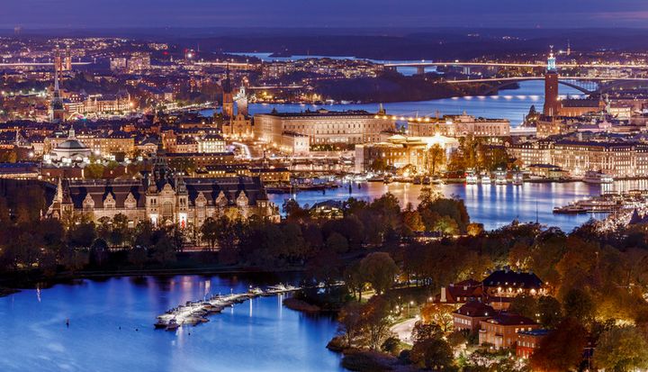 Stockholm by night with the Nordic Museum, lower left, and the Royal Palace, center. 