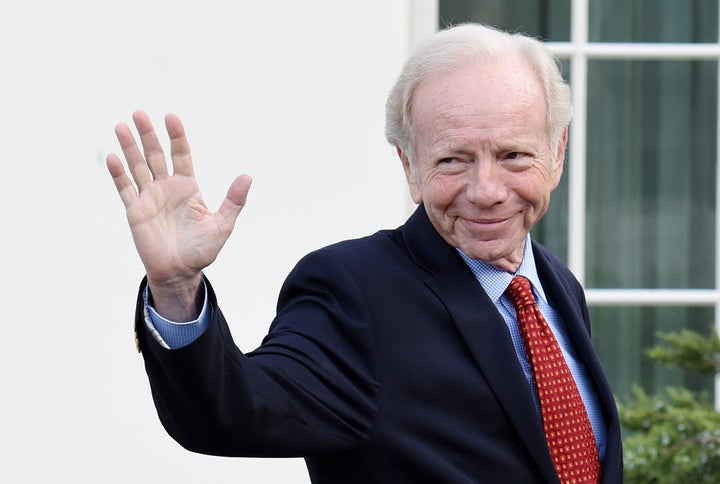 Former Sen. Joe Lieberman leaves the West Wing of the White House after meeting with President Donald Trump on Wednesday.