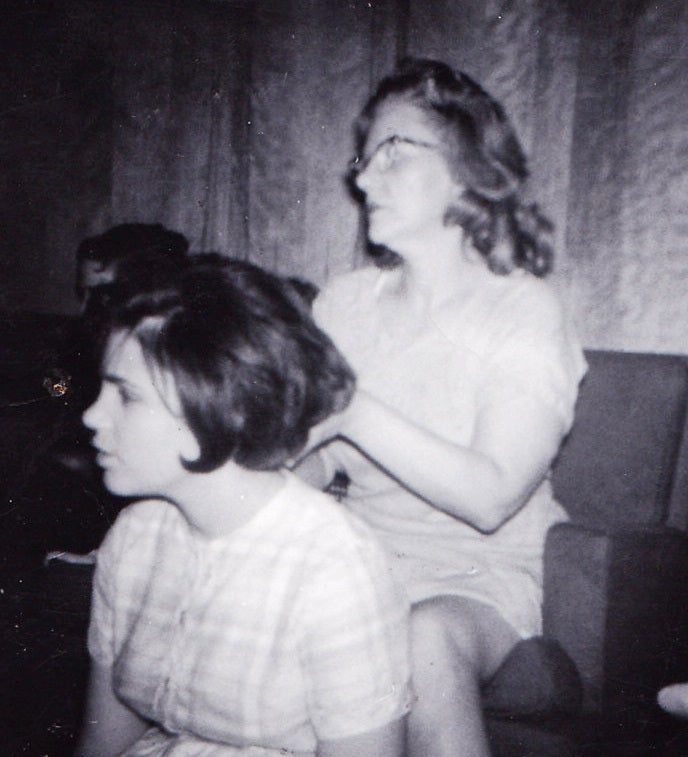 Viola Liuzzo brushing daughter Mary’s hair just before she went to Selma, Alabama to help African Americans register to vote.