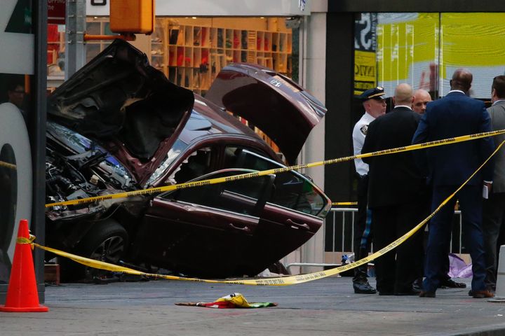 Officers secure the area after Rojas drove his car into pedestrians in New York's Times Square 
