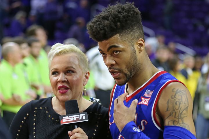 Holly Rowe, pictured with Kansas guard Frank Mason III in February, thanked ESPN for renewing her contract amid her cancer battle.