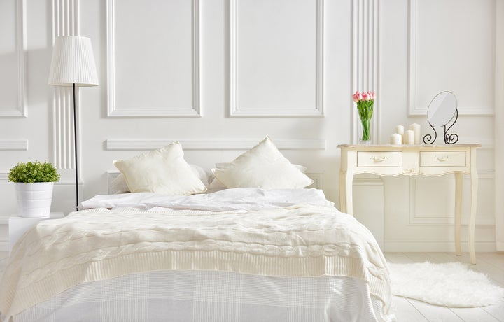 <p>bright bedroom with windows</p>