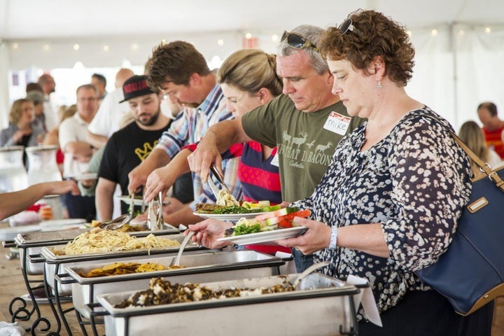 Campers get their fill at a gourmet dinner.