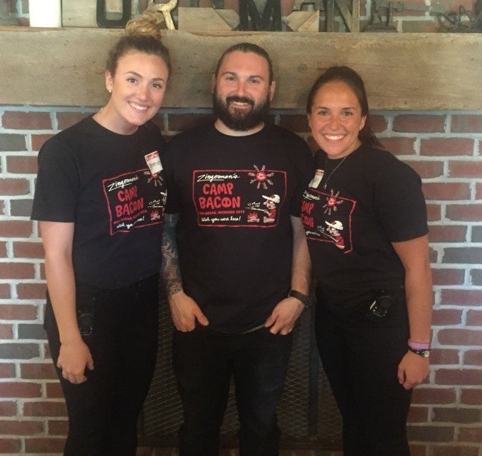 Camp Bacon attendees sport their camp T-shirts.