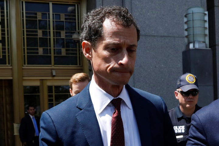 Former Rep. Anthony Weiner exits federal court Friday after pleading guilty to one count of sending obscene messages to a minor.