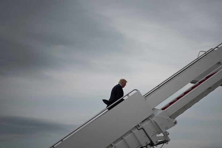 US President Donald Trump boards Air Force One.