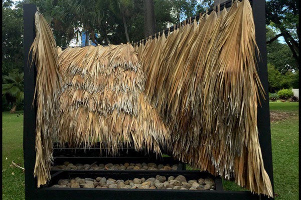 SEAN CONNELLY (b. 1984); Thatch Assembly with Rocks (2060s); 2017; wood, thatching, rocks; dimensions variable