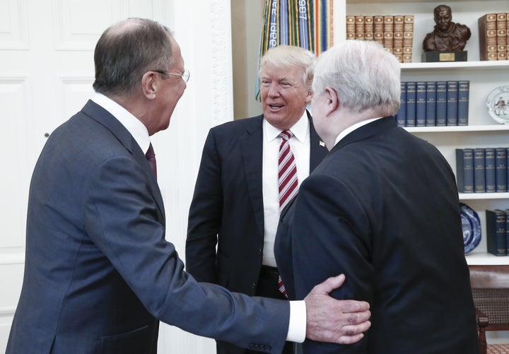 WASHINGTON, D.C., USA - MAY 10, 2017: Russia's Foreign Minister Sergei Lavrov, US President Donald Trump, and Russian Ambassador to the United States Sergei Kislyak (L-R) talking during a meeting in the Oval Office at the White House. Alexander Shcherbak/TASS (Photo by Alexander Shcherbak\TASS via Getty Images)