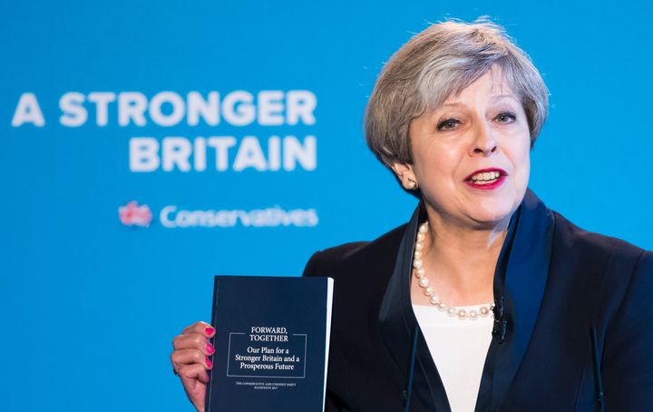 Theresa May unveils her party's manifesto