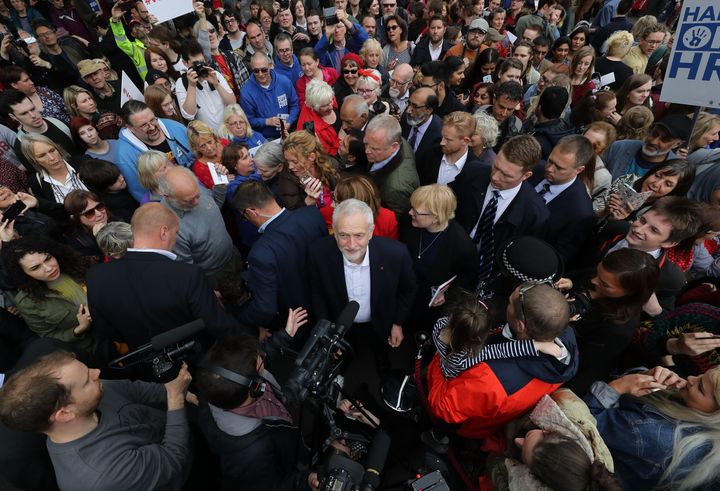 Jeremy Corbyn surrounded by supporters in Huddersfield.