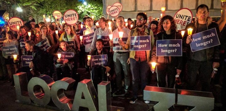 Protesters holding a candlelight vigil at Yale President Salovey’s home. Local 33 UNITE HERE