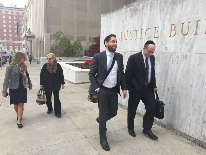 Rabbis Ari Hart (front, left) and Mike Moskowitz (front, right) on their way to New York State Assembly offices in Albany. They are part of a coalition lobbying to pass the Child Victims Act. 