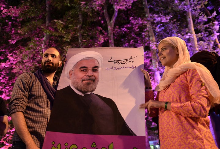 Supporters of Rouhani celebrate after the results of the Iran vote were announced. Tehran, Iran. May 20.