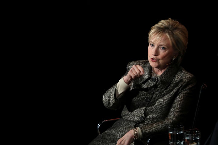 Former Secretary of State Hillary Clinton appears onstage at the Women in the World Summit in New York, April 6, 2017.