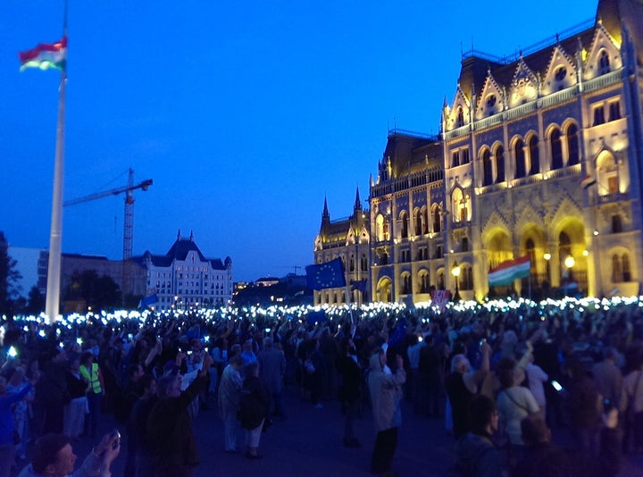 Thousands of protestors gather outside Hungary’s parliament tonight.