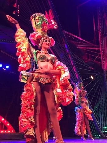 <p>Dancers at the Tropicana pose after a performance</p>