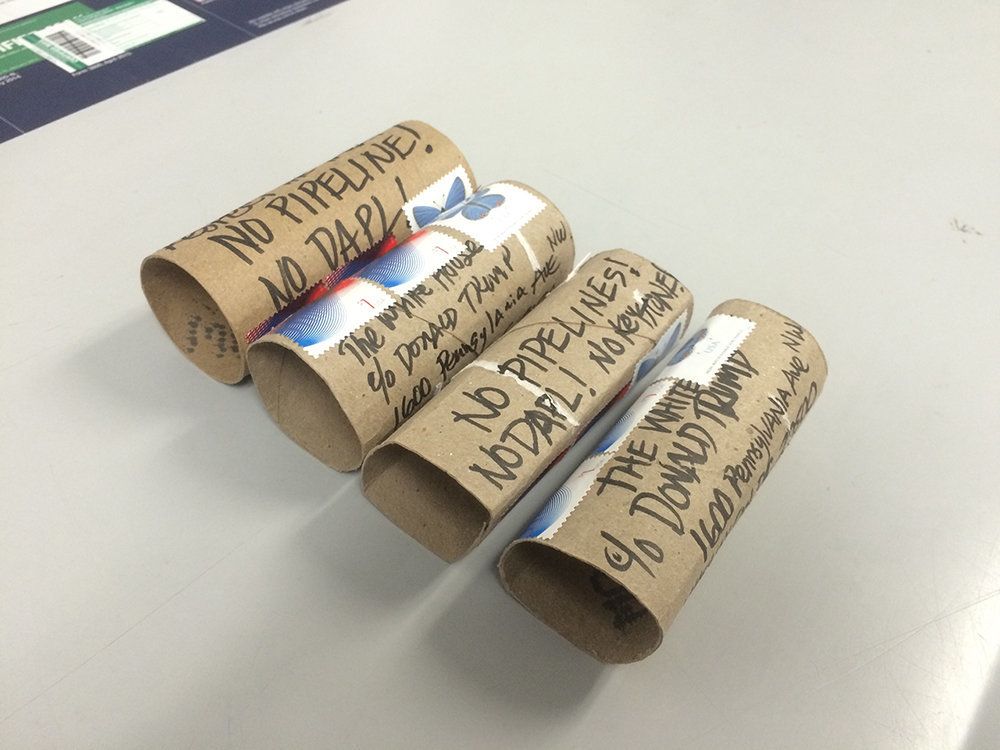 Donny Miller, "No DAPL Toilet Paper Rolls." Cardboard toilet paper rolls.