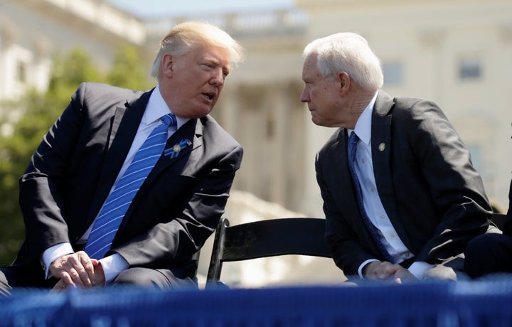 President Donald Trump speaks with Attorney General Jeff Sessions on the West Lawn of the U.S. Capitol on May 15, 2017.