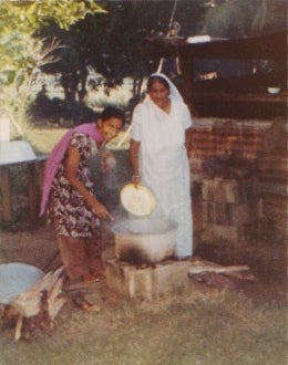 Chahal’s great grandmother (father’s grandmother) and father’s aunt, cooking dinner in Tavua, Fiji.