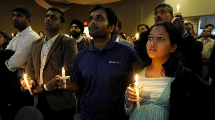 Kuchibhotla’s friend, Alok Madasani, survived the shooting. He and his wife Reepthi Gangula in attendance at a vigil for their friend.