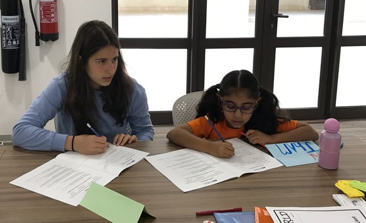 Learners in Dubai, UAE setting up the foundations of their entrepreneurship project - Color Marks, Origami Bookmarks.