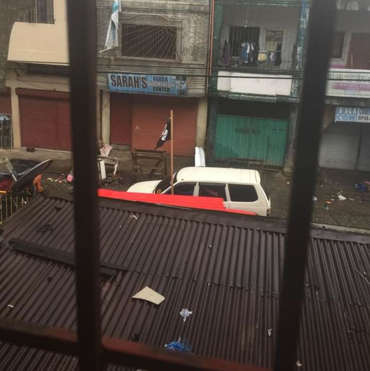 The Islamic State flag has been seen atop vehicles in Marawi where the military has been locked in a gun battle with local militants