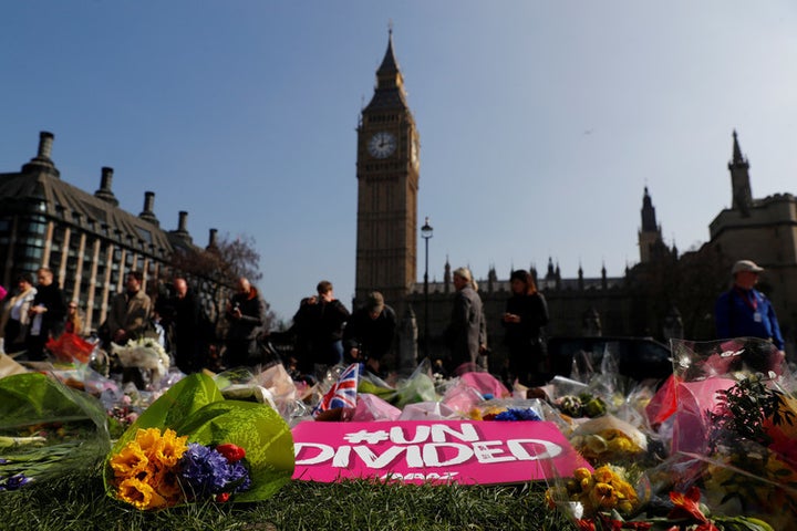 Floral tributes lie in Parliament Square following the March 27 2017 attack in Westminster, central London, Britain.