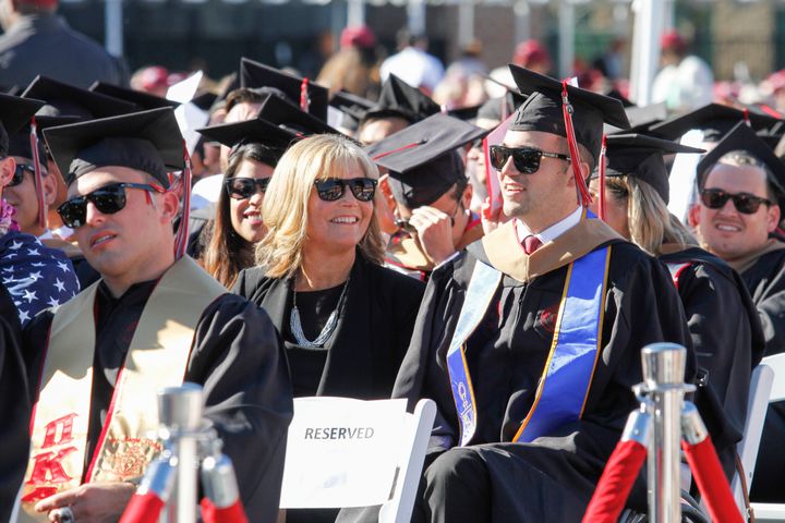 Marty O’Connor, 29, is seen with his mother, Judy O’Connor, during his graduation ceremony on Saturday.