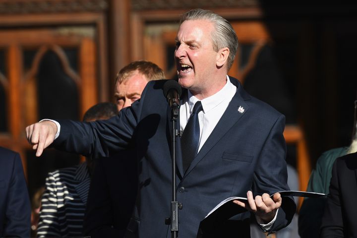 Poet Tony Walsh speaks as members of the public gather at a vigil to honour the victims of Monday evening's terror attack, at Albert Square