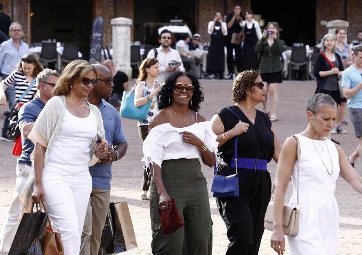 Former U.S. first lady Michelle Obama takes a walk through Piazza del Campo's Square during her and husband's visit to Siena, Tuscany, Italy on May 22.