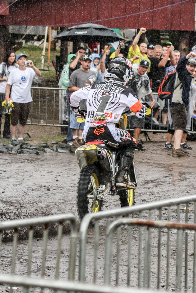 After finally restarting the ailing RM-Z450, Dungey rocketed through the starting grid, crossing over the starting gate nearly a minute behind the rest of the 40-rider field as fans cheered on and Hurricane Irene began to rear her ugly side.