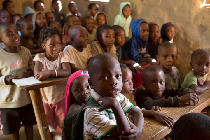 Refugee children from all across eastern and central Africa share a one room school house on April 4, 2017 in the Nakavalie Refugee Settlemnt in southern Uganda.