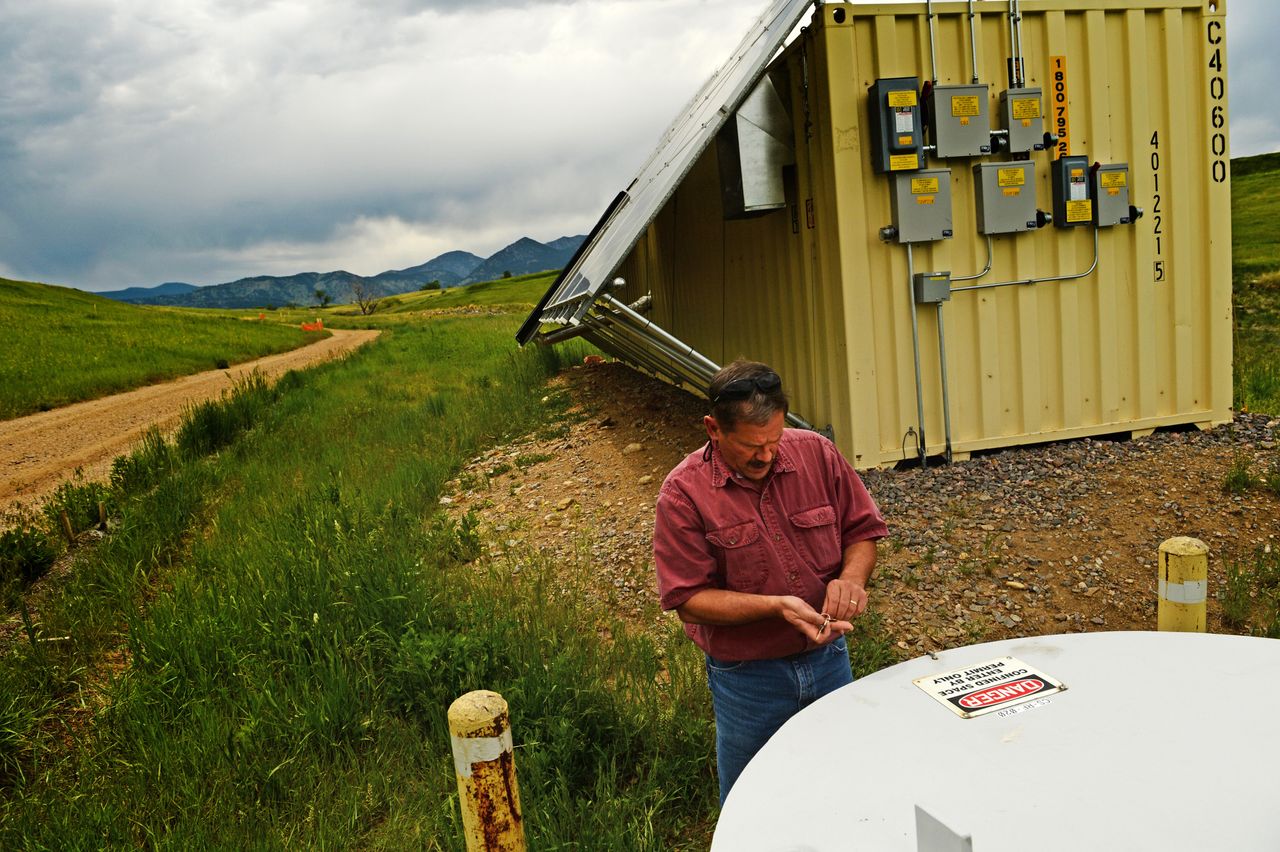 Scott Surovchak, U.S. Department of Energy site manager for Rocky Flats, shows off a water testing and treatment facility at the former site of the nuclear weapons production facility on May 29, 2014.