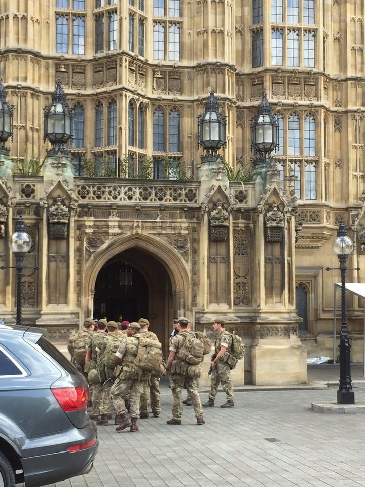 Armed soldiers were pictured arriving at Parliament on Wednesday amid a