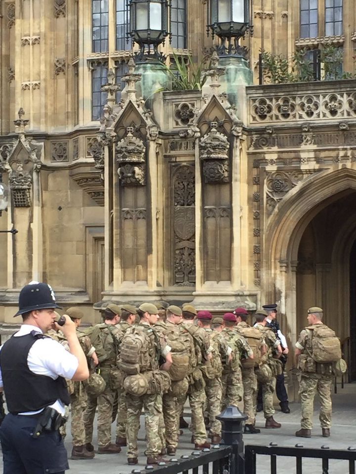 The unusual sight of military service people arriving at Parliament comes amid increased security