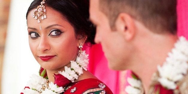 Poorna and her husband Rob on their wedding day.